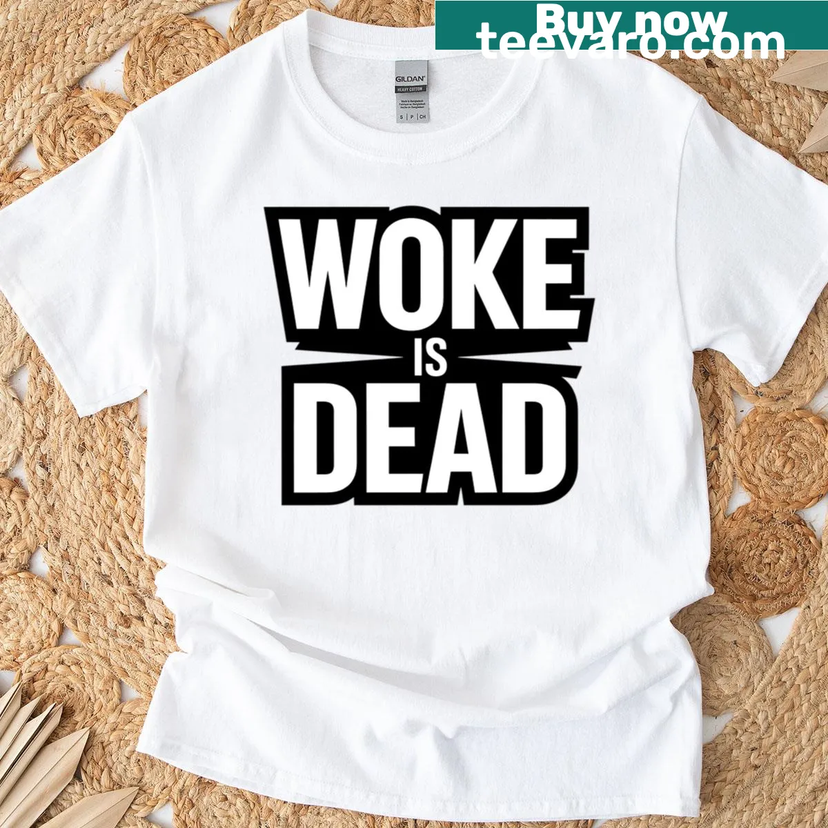 Anti Woke graphic t-shirt displaying the text 'Woke is Dead' prominently — on a men's t-shirt