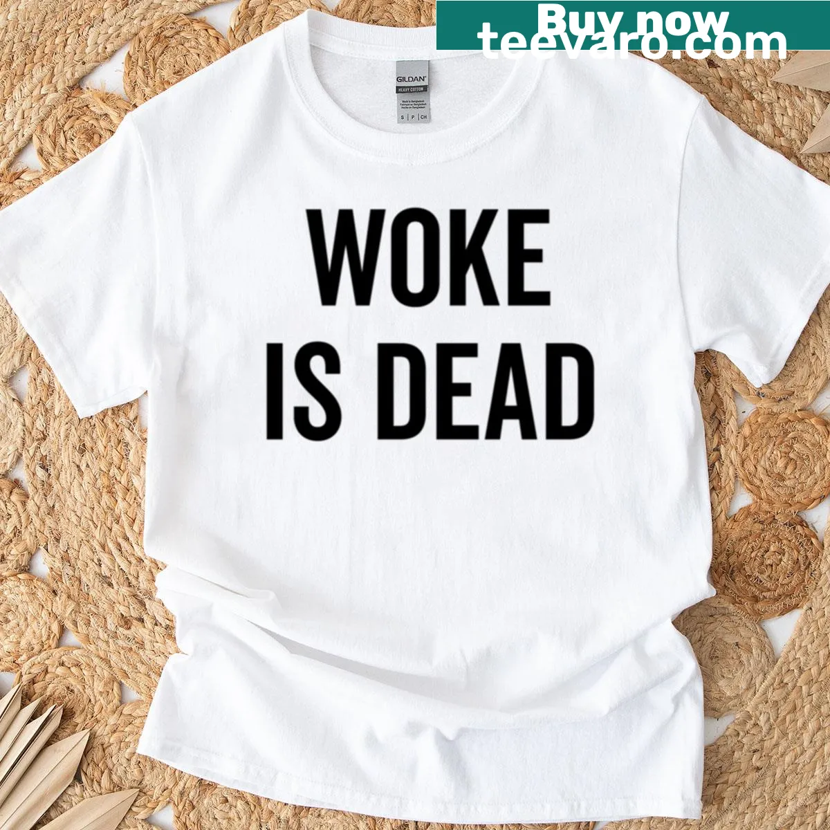 Text design stating 'Woke Is Dead' on a T-shirt. — on a men's t-shirt