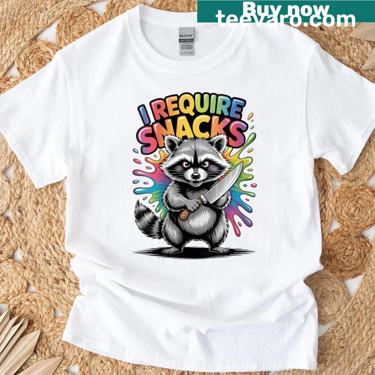 Funny Christmas T-shirt featuring a raccoon and the phrase 'I Require Snacks' — on a men's t-shirt
