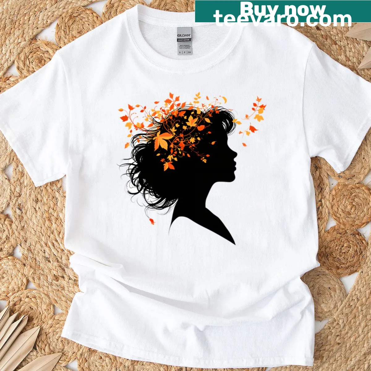 Silhouette of a woman with leaves in hair on autumn-themed t-shirt — on a men's t-shirt
