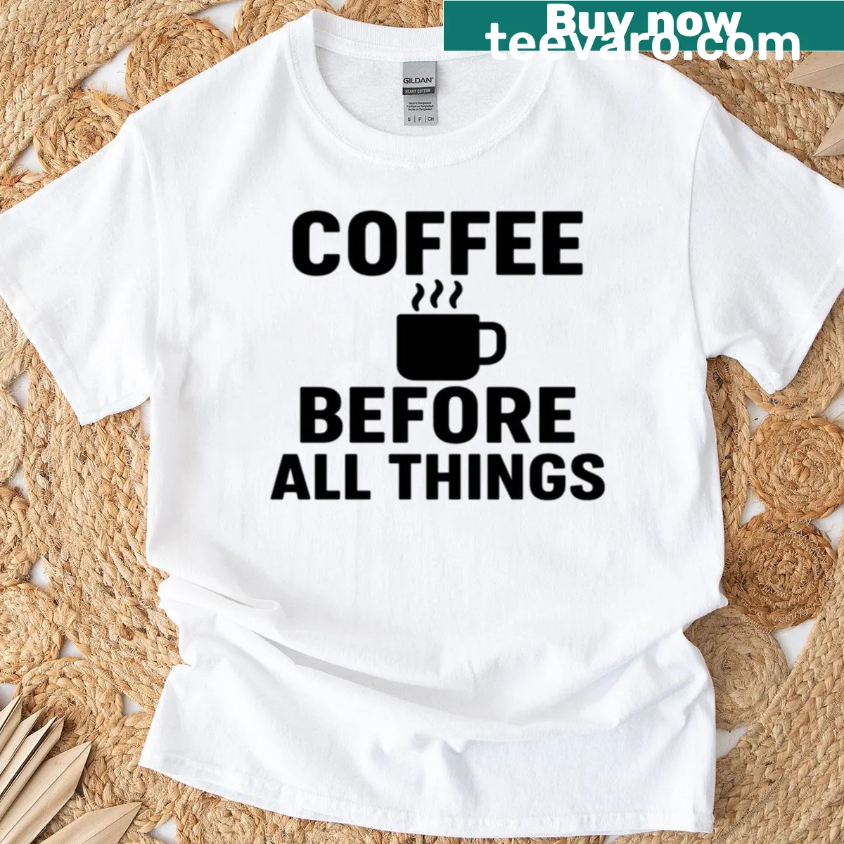 Minimalist design shirt featuring the phrase 'Coffee Before All Things' in clean typography — on a men's t-shirt