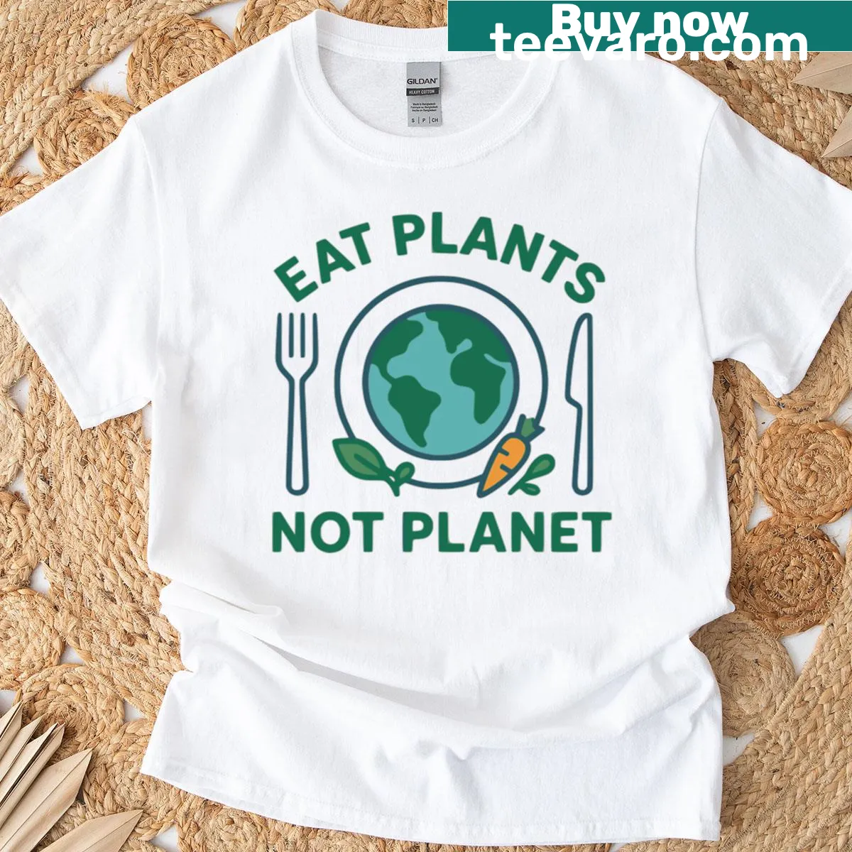 T-shirt featuring the phrase 'Eat Plants Not Planet' in bold typography — on a men's t-shirt