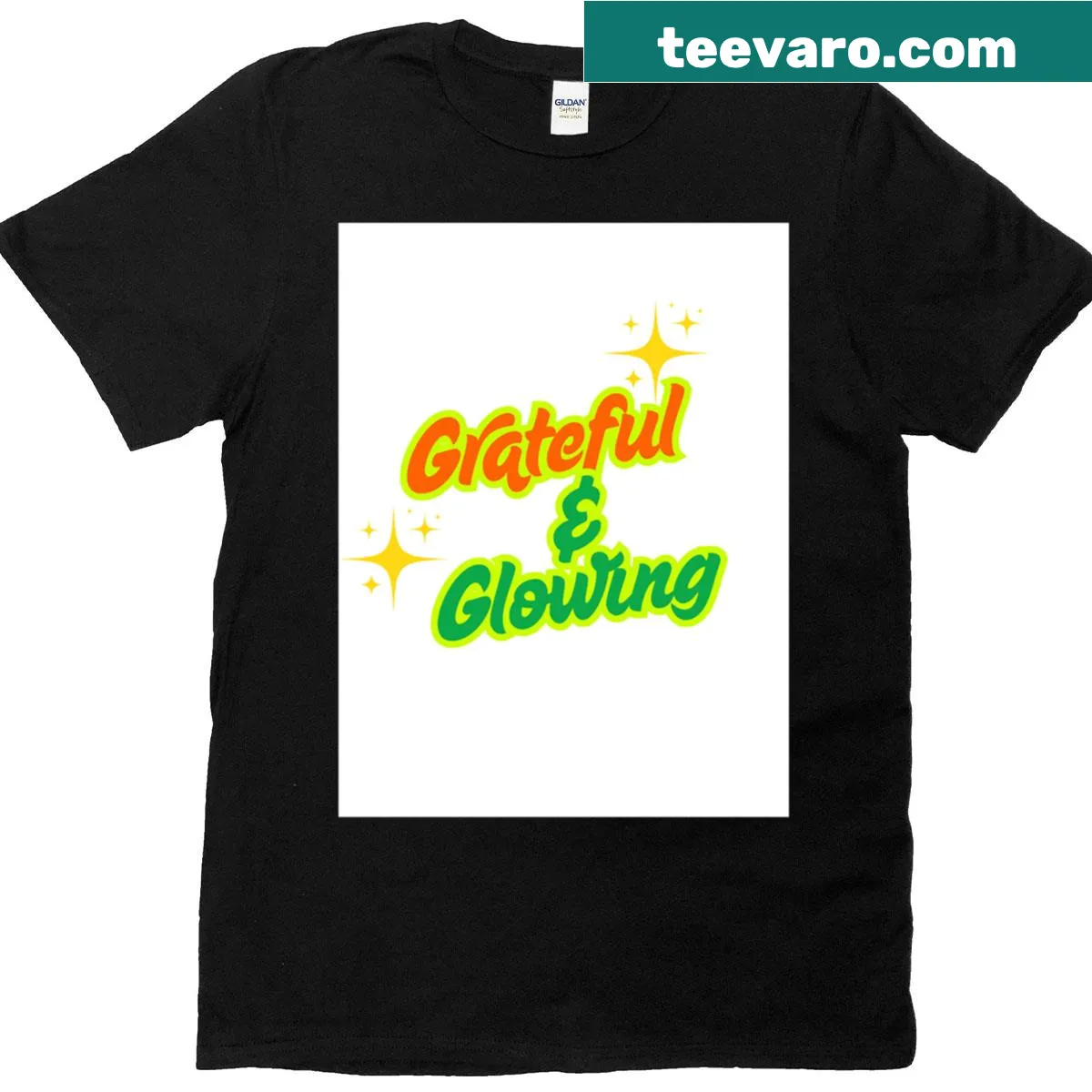 Trendy typography T-shirt with 'Grateful And Glowing' text — on a men's t-shirt