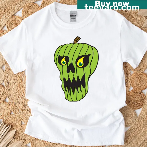 Green pumpkin skull graphic on a Halloween T-shirt
