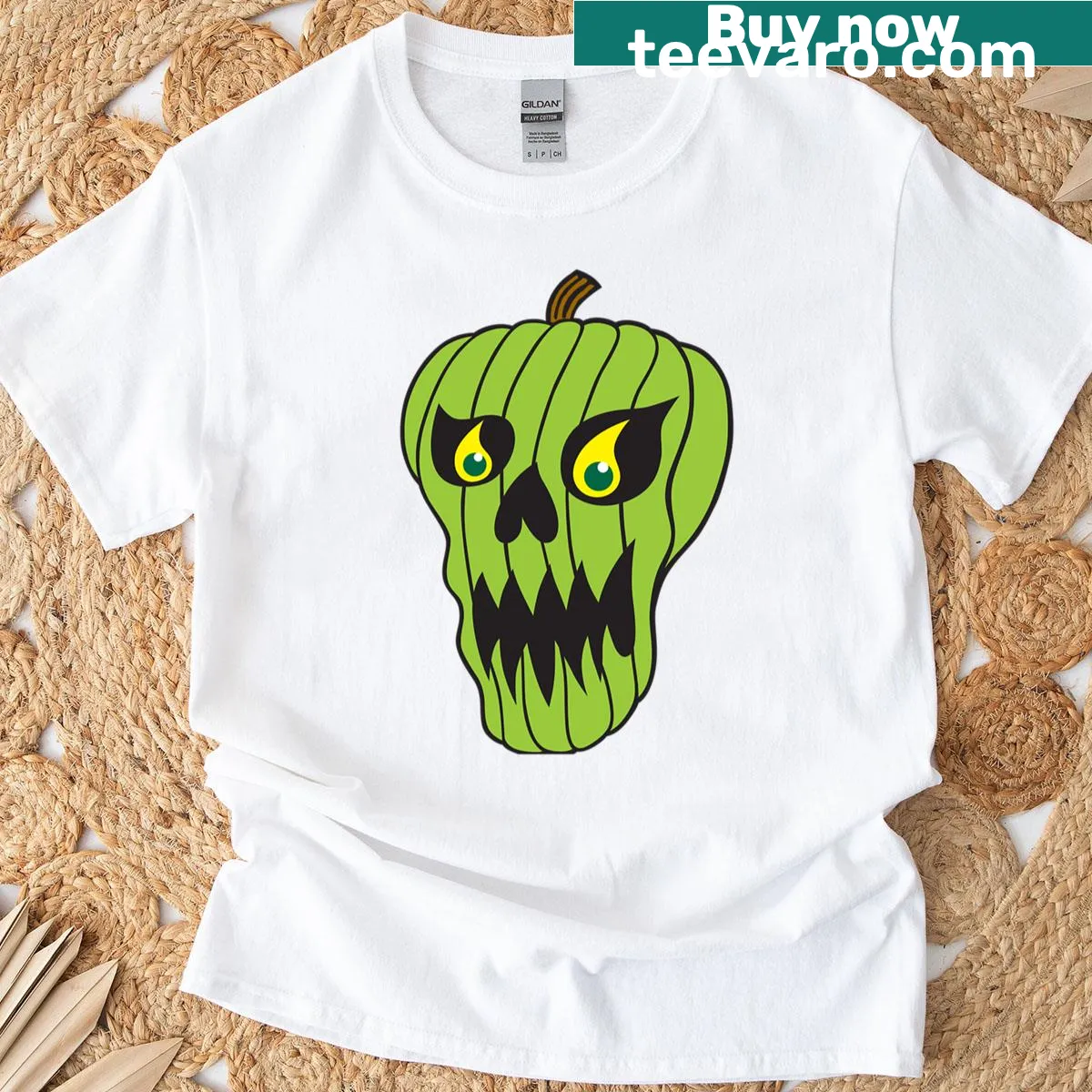 Green pumpkin skull graphic on a Halloween T-shirt — on a men's t-shirt