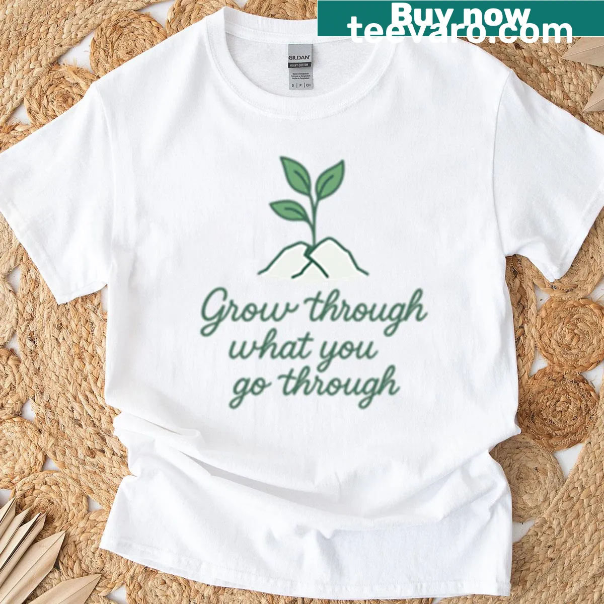 Illustrated t-shirt with a resilient plant and motivational quote — on a men's t-shirt