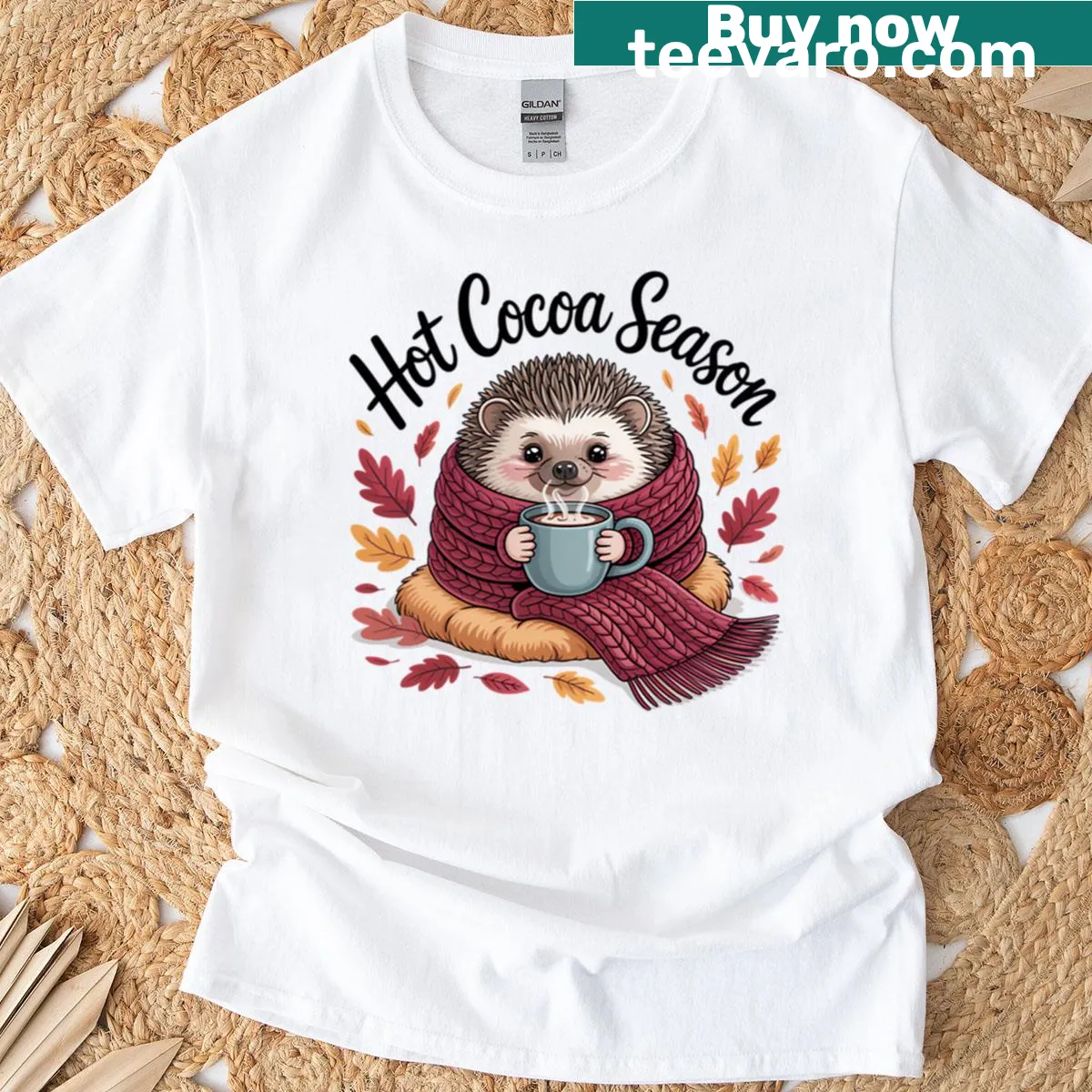 Cute hedgehog enjoying hot cocoa surrounded by autumn leaves. — on a men's t-shirt