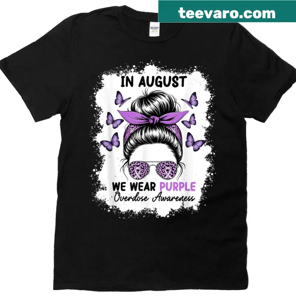 Line-art messy bun and purple ribbon on an overdose awareness T-shirt
