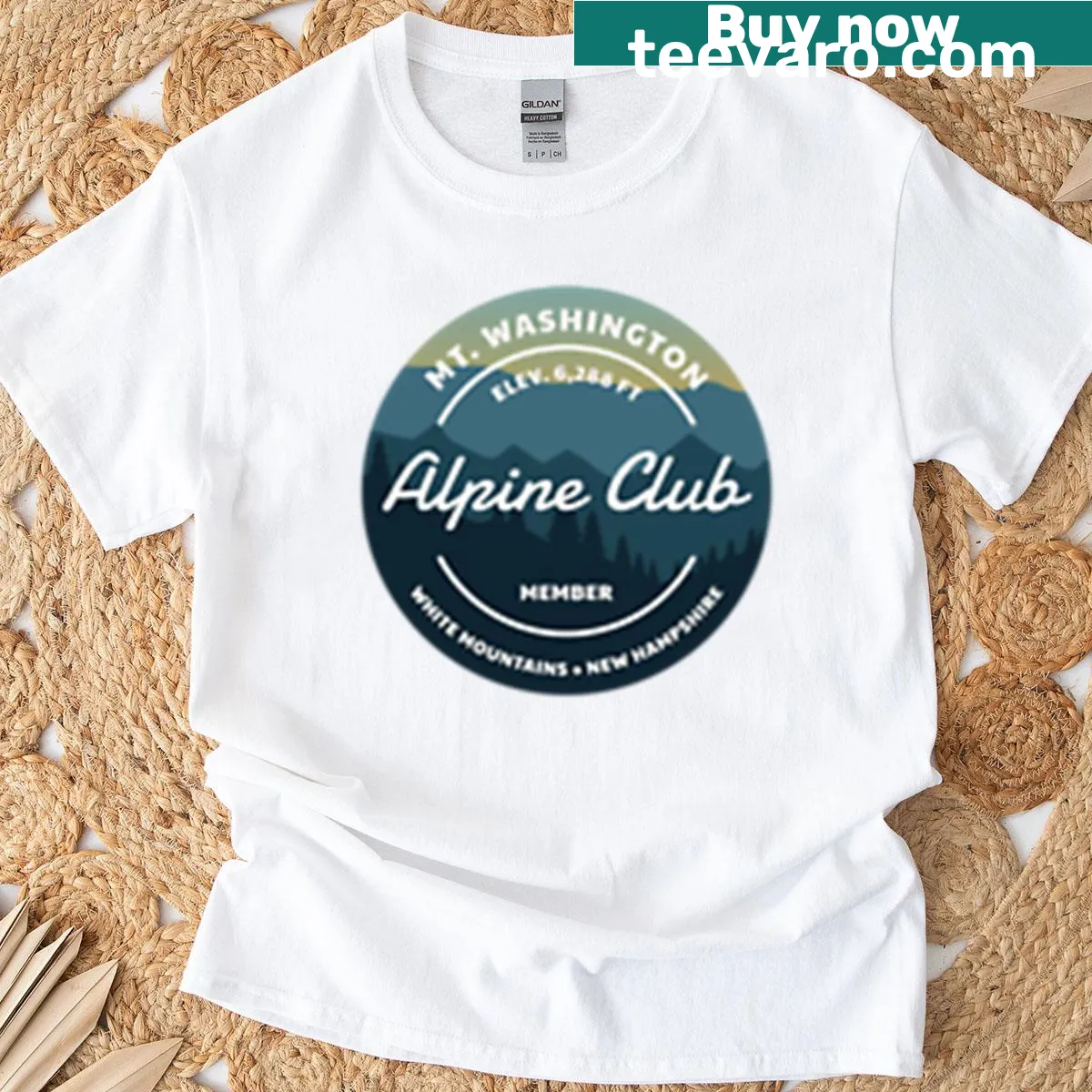Mt Washington Alpine Club badge t-shirt — on a men's t-shirt