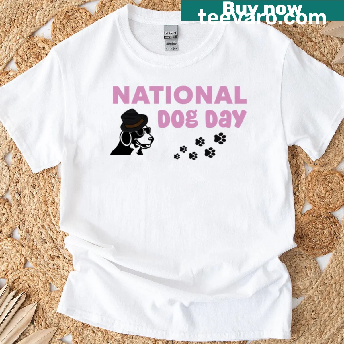 Dog graphic with paw prints on National Dog Day T-shirt — on a men's t-shirt