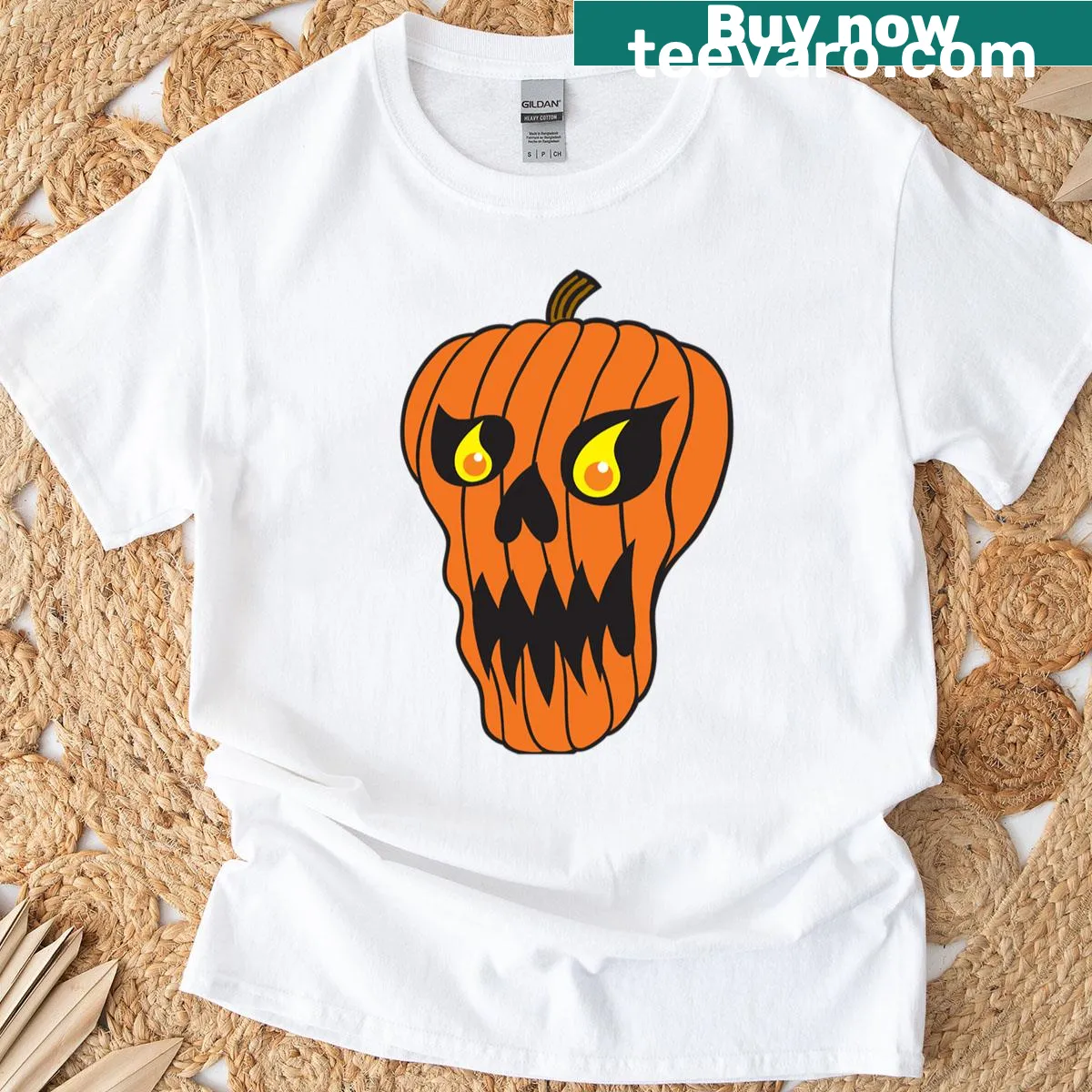 Halloween-themed shirt with pumpkin skull illustration — on a men's t-shirt