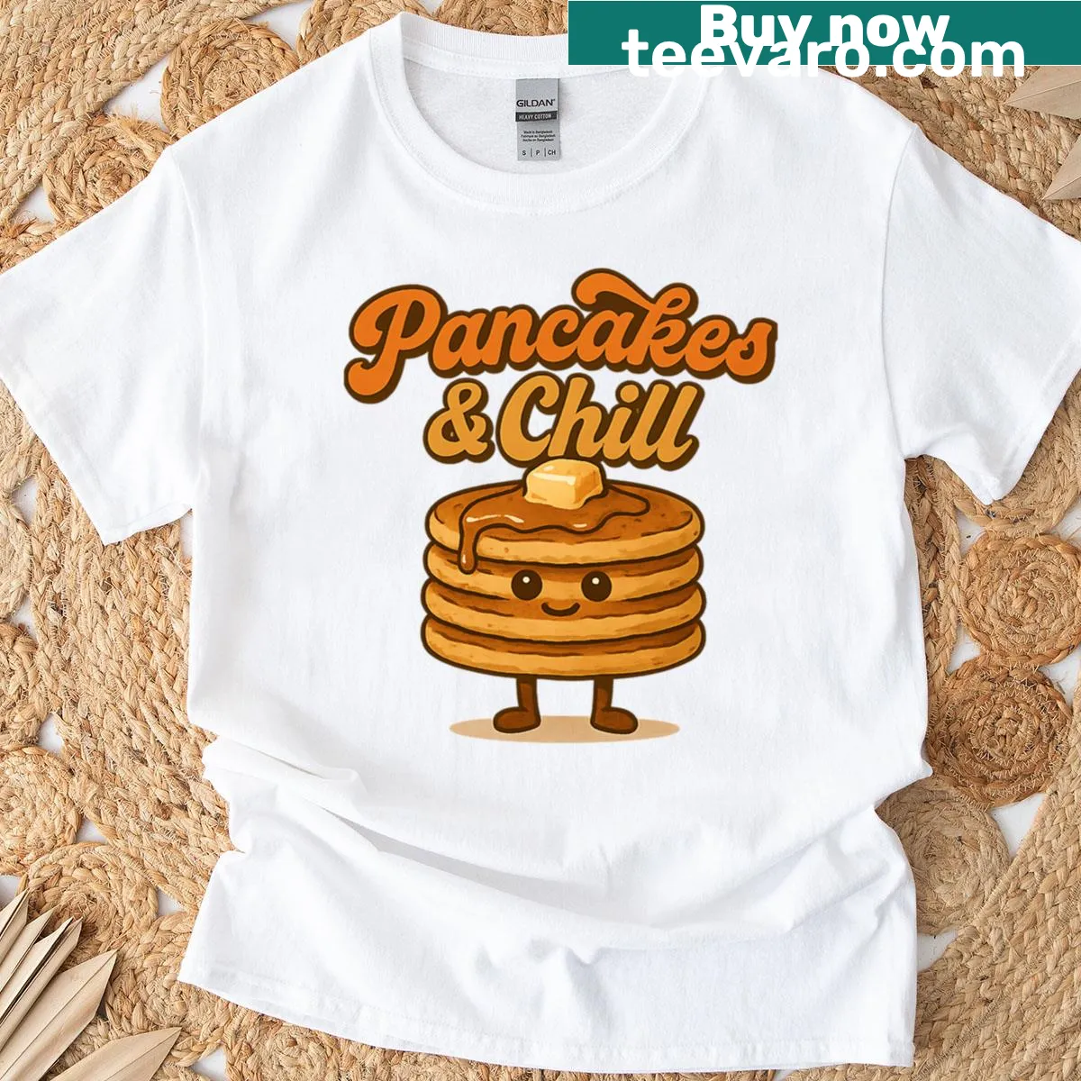 Illustrative T-shirt featuring a stack of pancakes and syrup — on a men's t-shirt