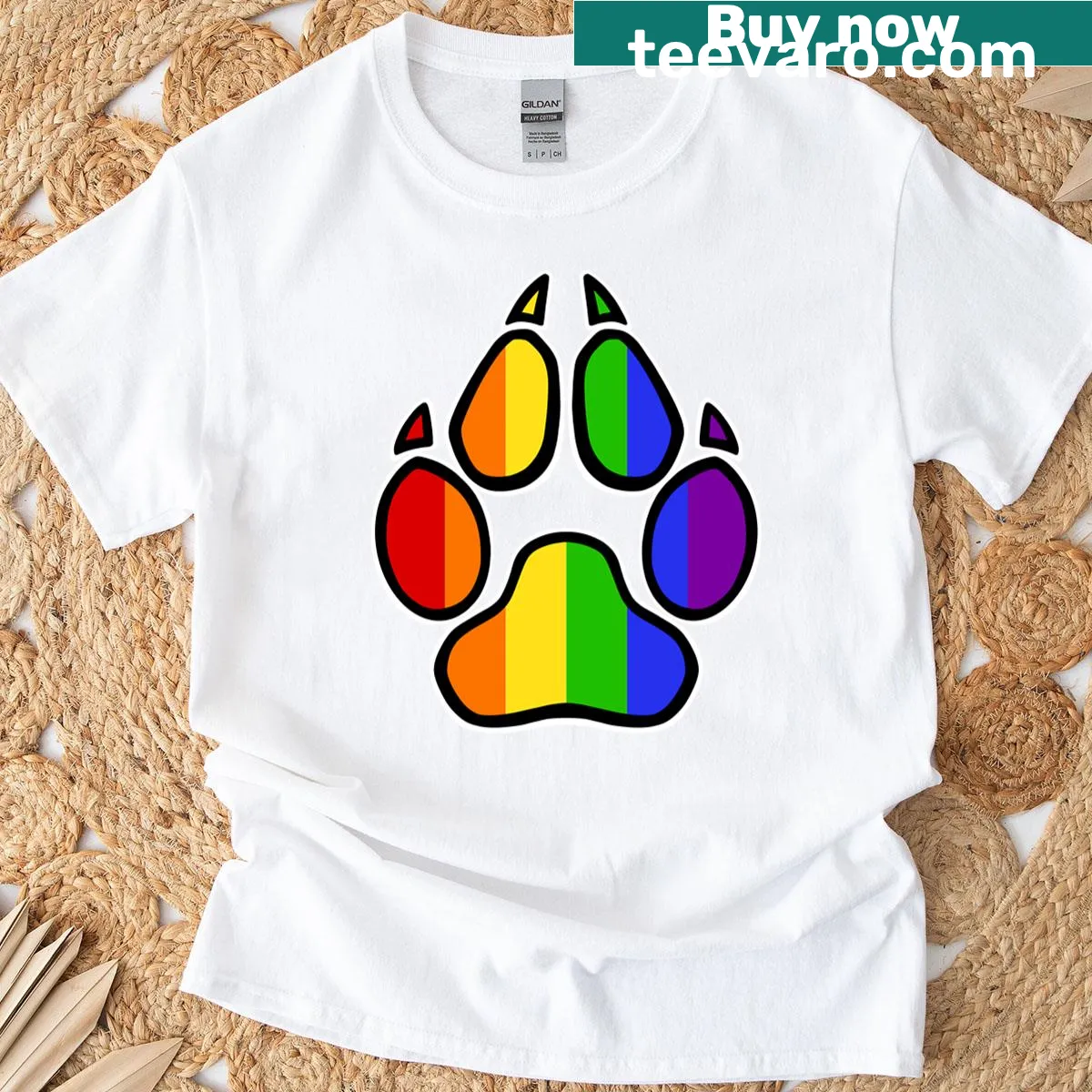 Pride-themed dog paw print t-shirt — on a men's t-shirt
