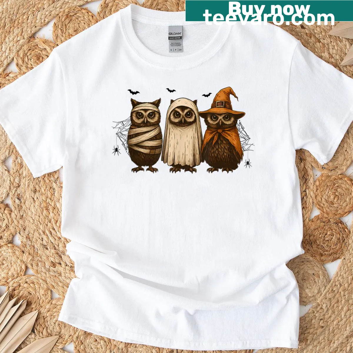 Charming retro Halloween design featuring ghosts, owls, and pumpkins — on a men's t-shirt