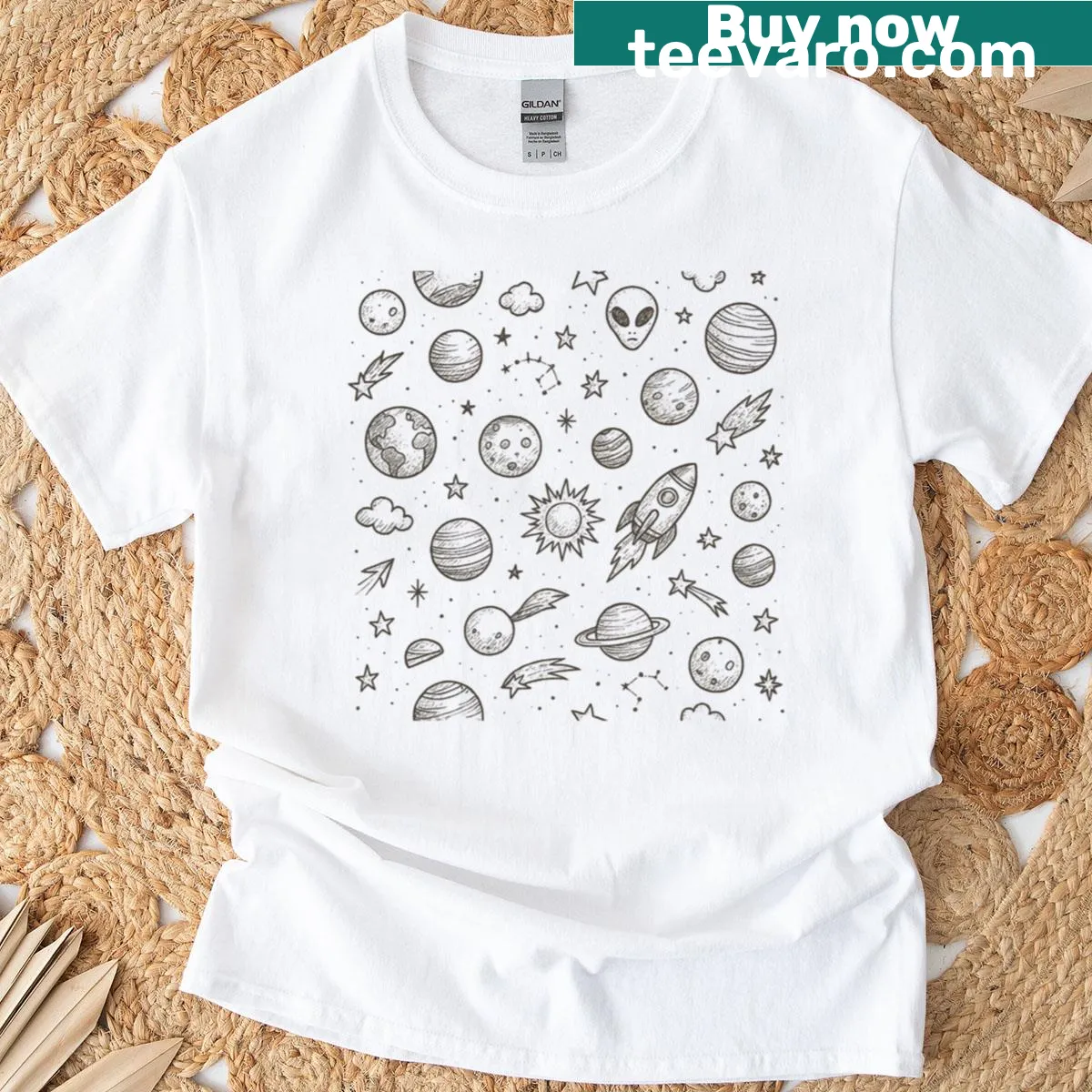 Doodle pattern of planets, rockets, and stars on a t-shirt — on a men's t-shirt