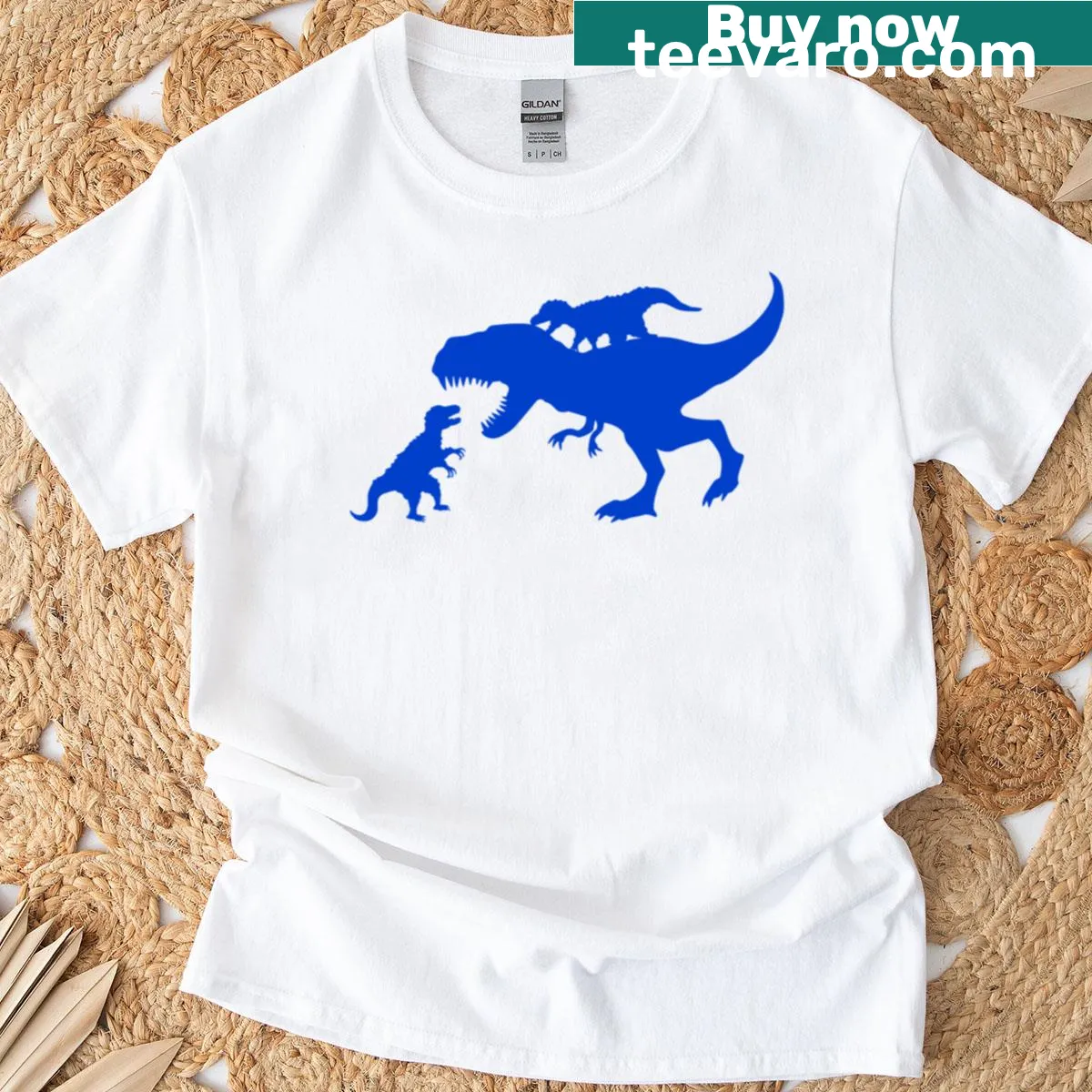 Cartoon dinosaur t-shirt featuring T-Rex and Velociraptor in action — on a men's t-shirt