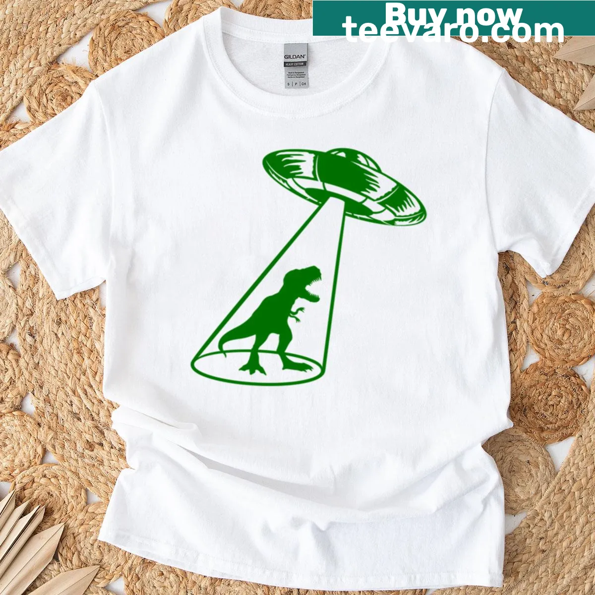 Cartoon T-rex being beamed up by a UFO on a T-shirt — on a men's t-shirt