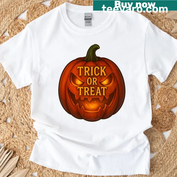 Glowing pumpkin illustration with 'Trick Or Treat' text on t-shirt