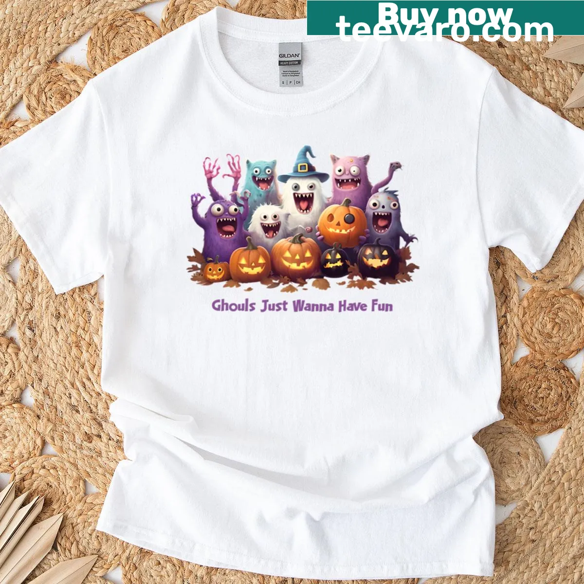 Whimsical t-shirt featuring ghouls and pumpkins for Halloween — on a men's t-shirt