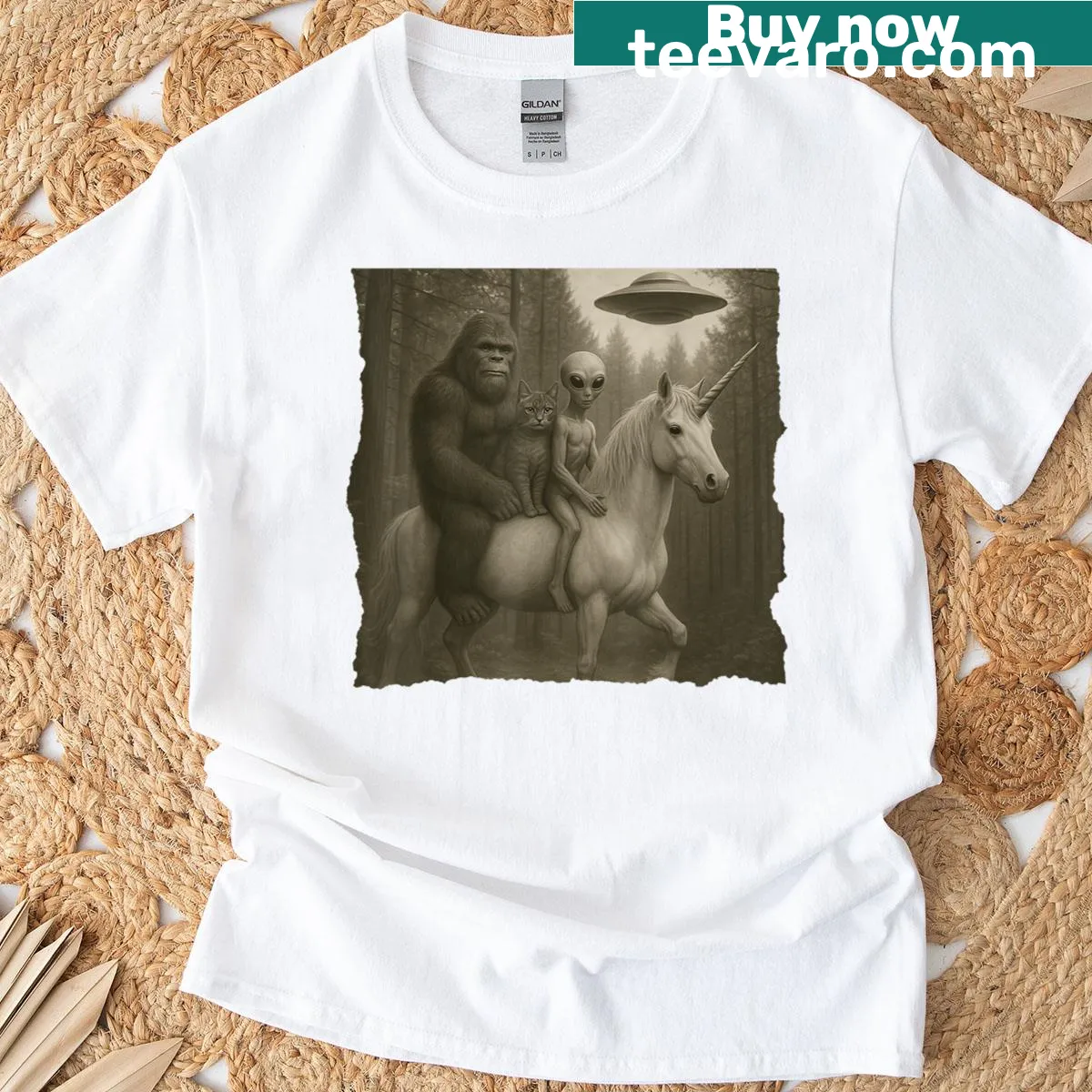 Whimsical t-shirt with Bigfoot, cat, alien, and unicorn illustration. — on a men's t-shirt
