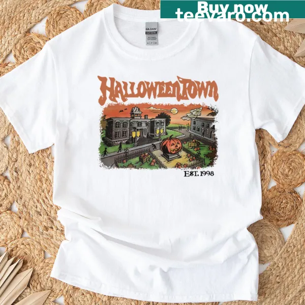 T-shirt featuring nostalgic Halloweentown imagery with pumpkins and Halloween themes.