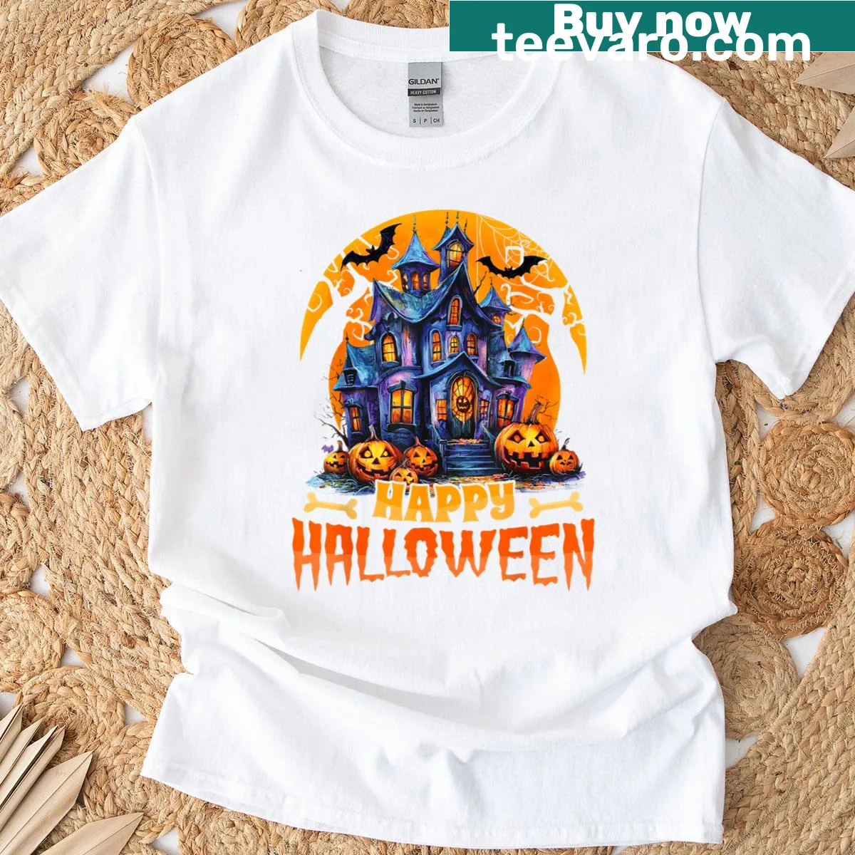 Haunted house graphic on a Halloween-themed T-shirt — on a men's t-shirt