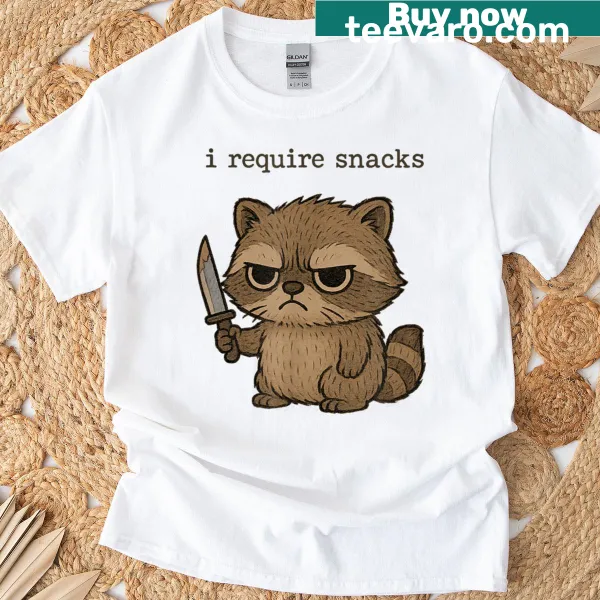 Cartoon raccoon T-shirt with the text about needing snacks