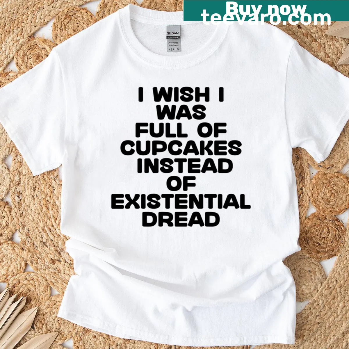Oversized T-shirt with humorous text about cupcakes and existential dread — on a men's t-shirt