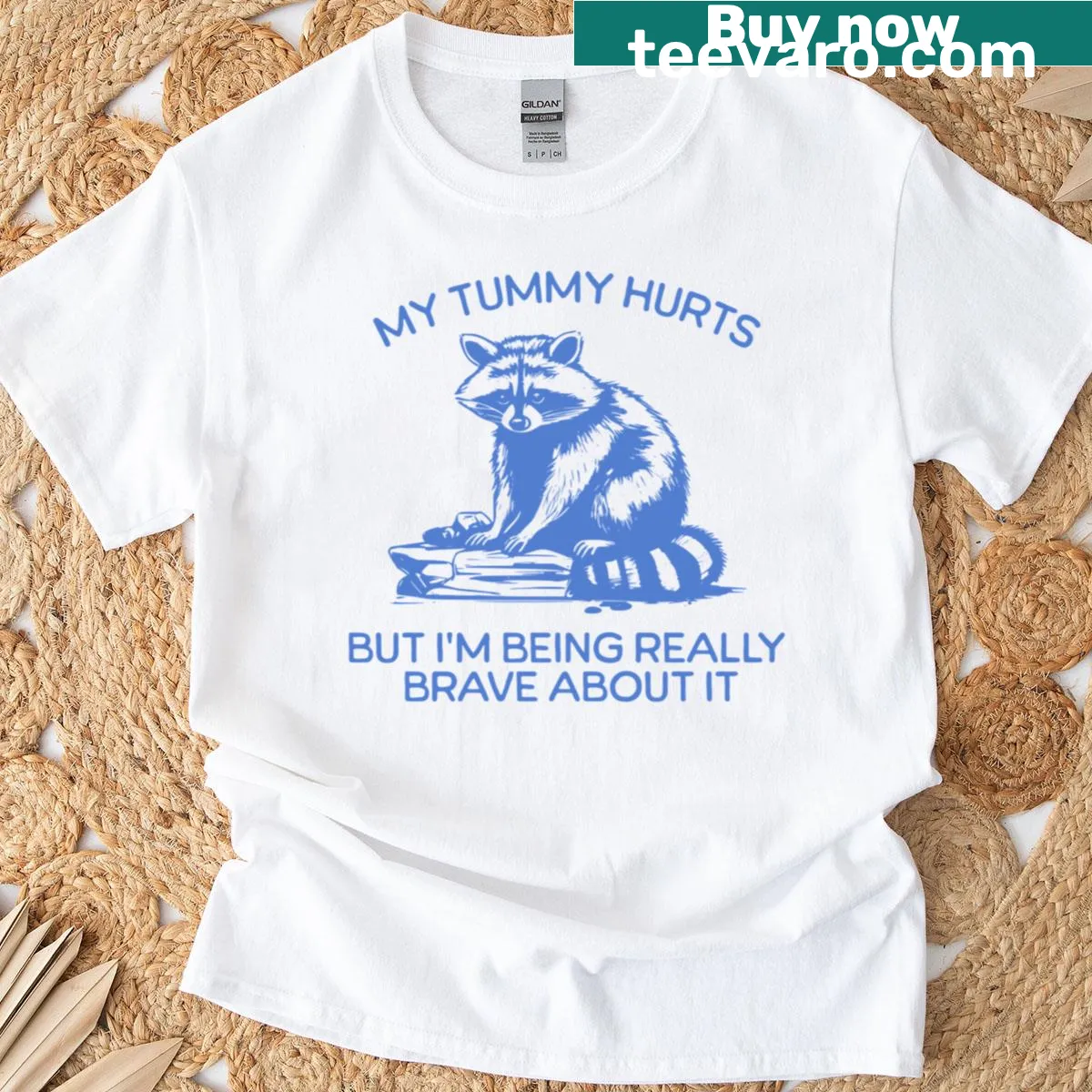 Oversized t-shirt featuring a funny raccoon graphic and humorous text — on a men's t-shirt