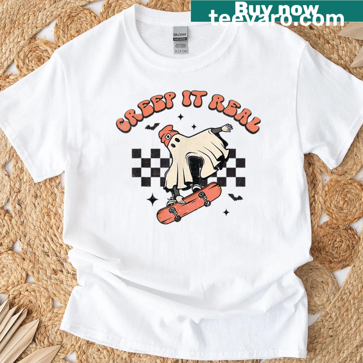 Vintage ghost graphic t-shirt with 'Creep It Real' text for Halloween — on a men's t-shirt