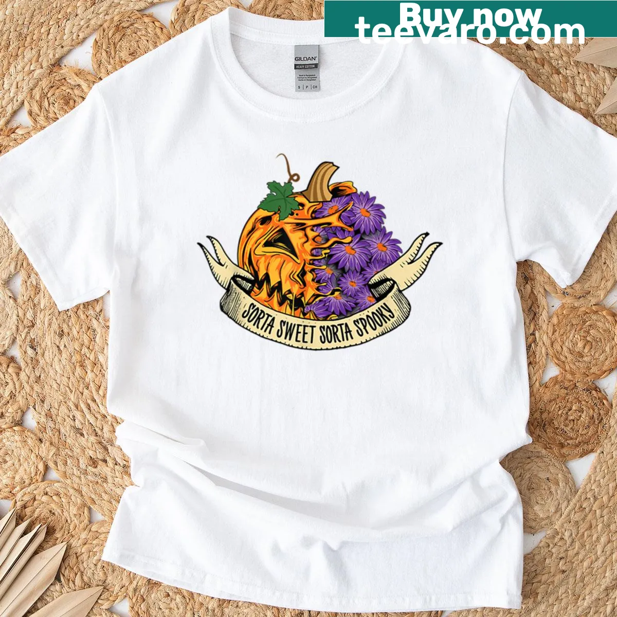 Halloween T-shirt featuring a cute pumpkin with flowers illustration — on a men's t-shirt