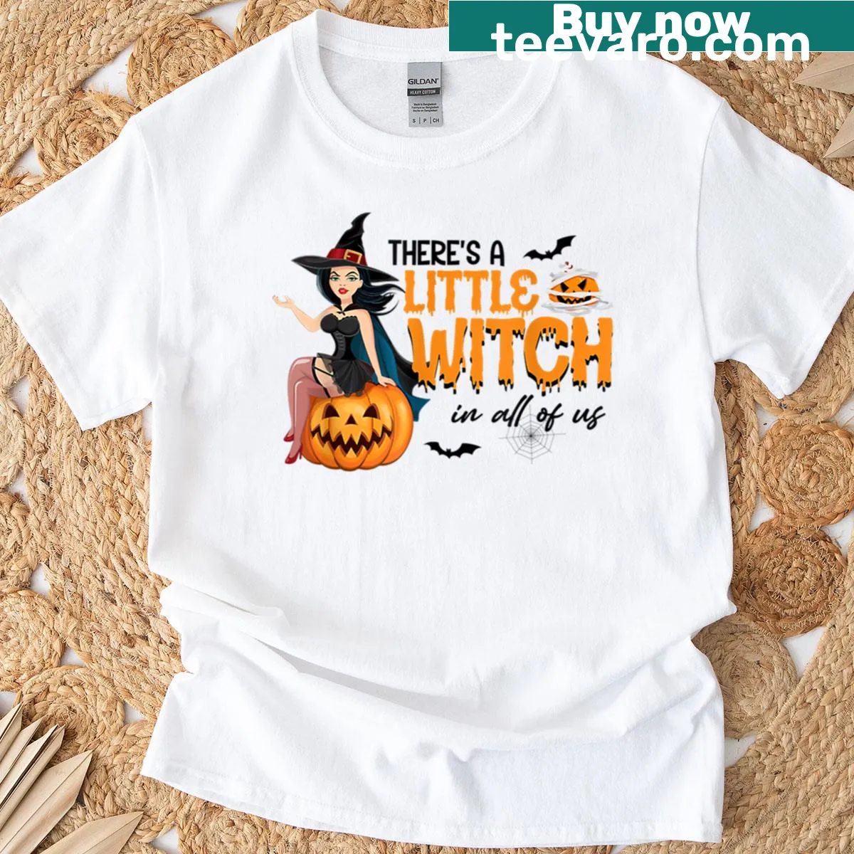 Whimsical Halloween T-shirt with the phrase 'There's A Little Witch In All Of Us' — on a men's t-shirt