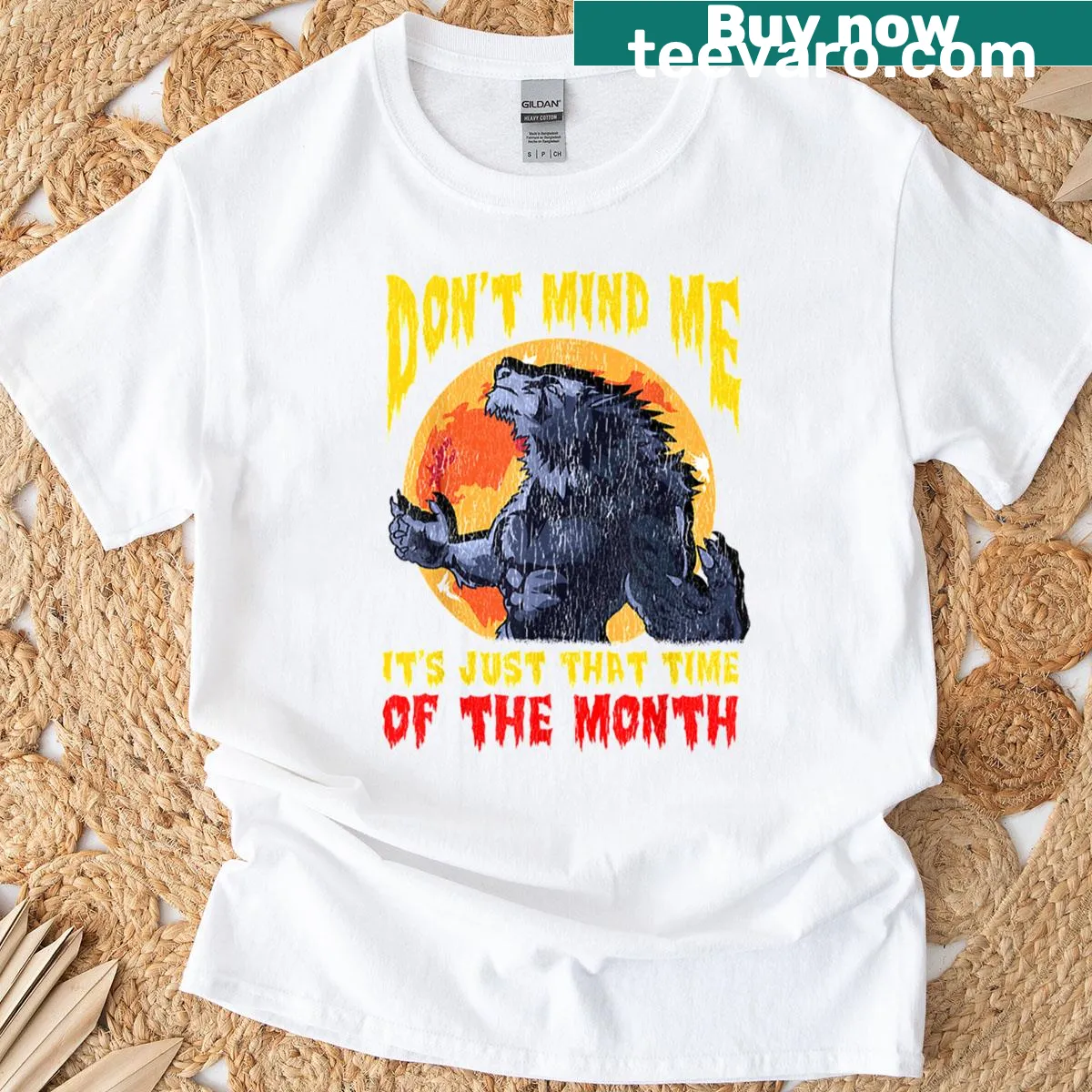 Oversized T-shirt with humorous werewolf graphic and text design. — on a men's t-shirt