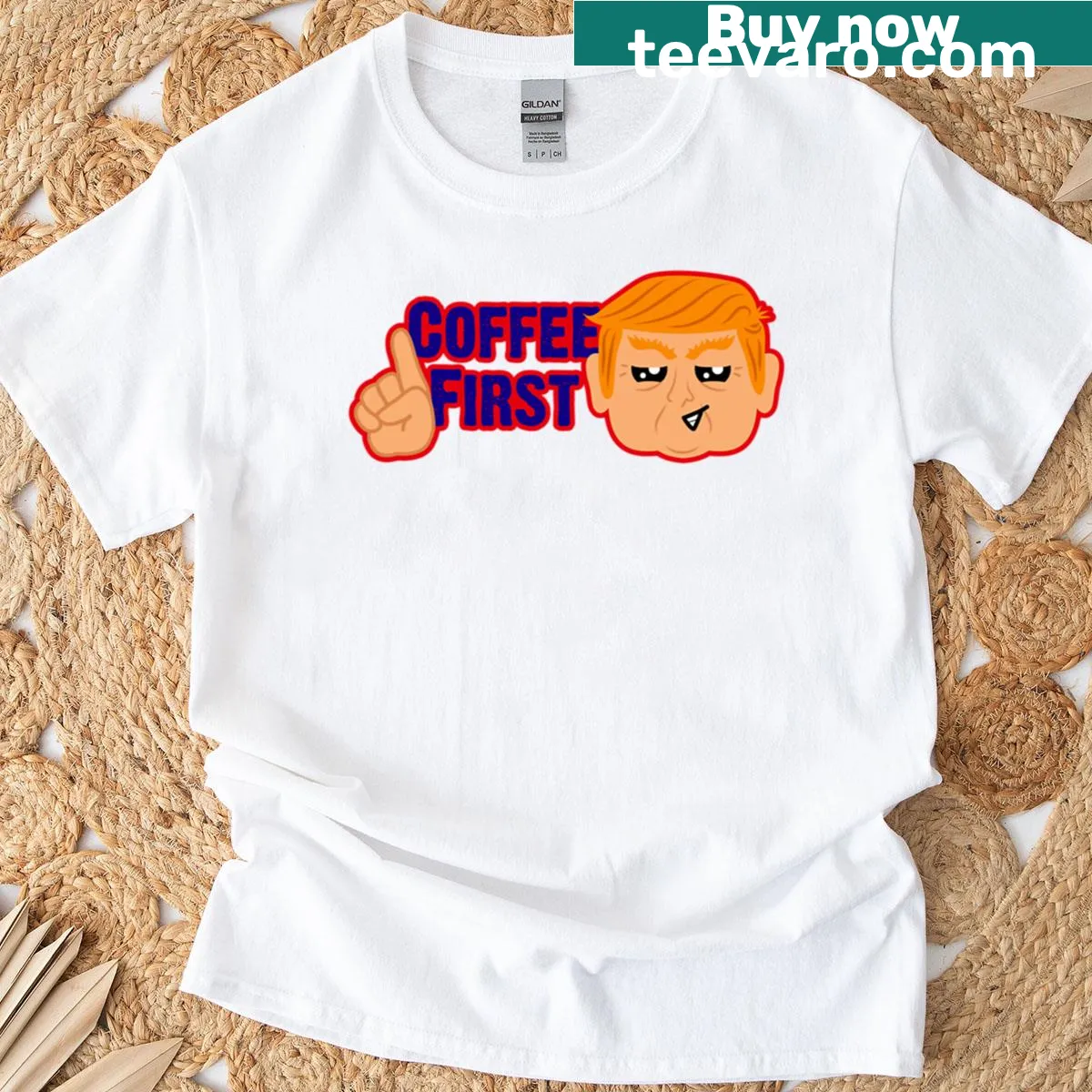 Fitted scoop T-shirt with 'Coffee First' Trump emoji message — on a men's t-shirt