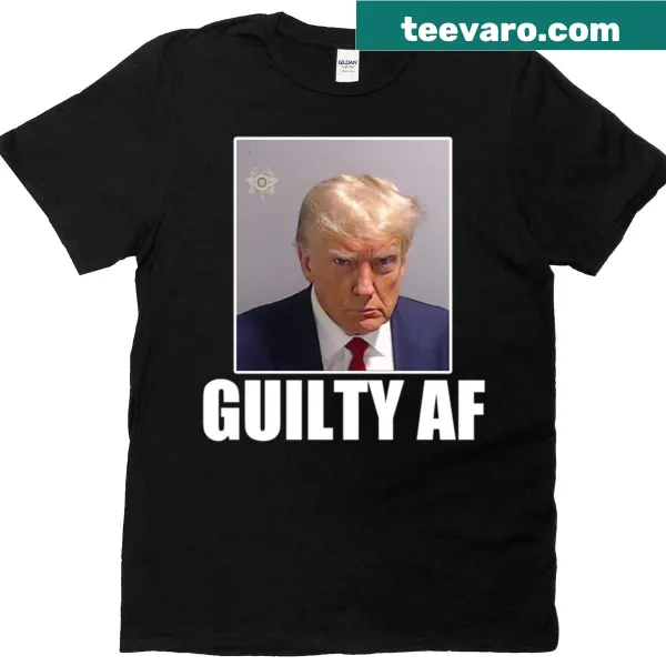 Illustrated Trump mugshot graphic on a political humor t-shirt