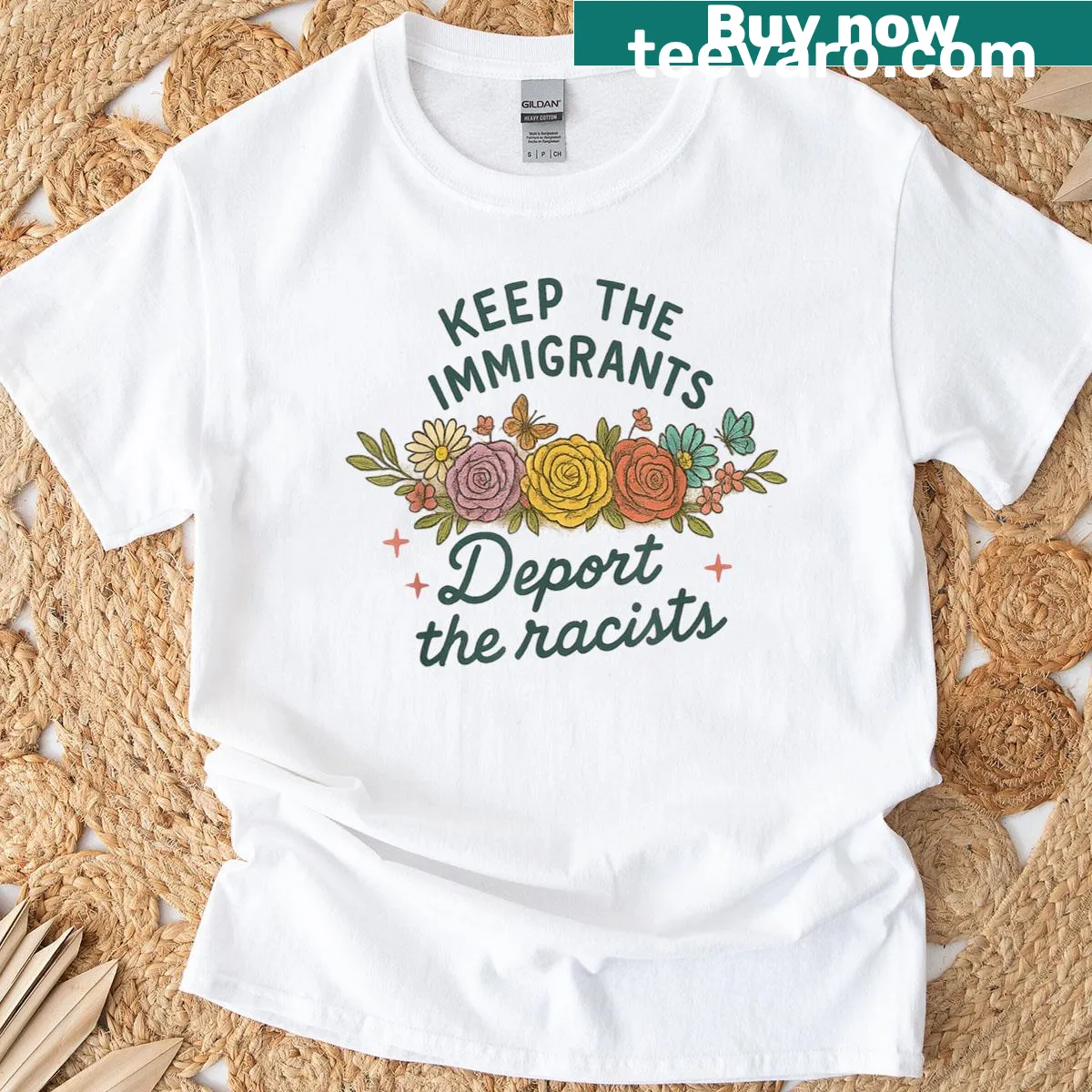 Statement T-shirt promoting inclusivity with the phrase 'Keep The Immigrants Deport The Racists'. — on a men's t-shirt