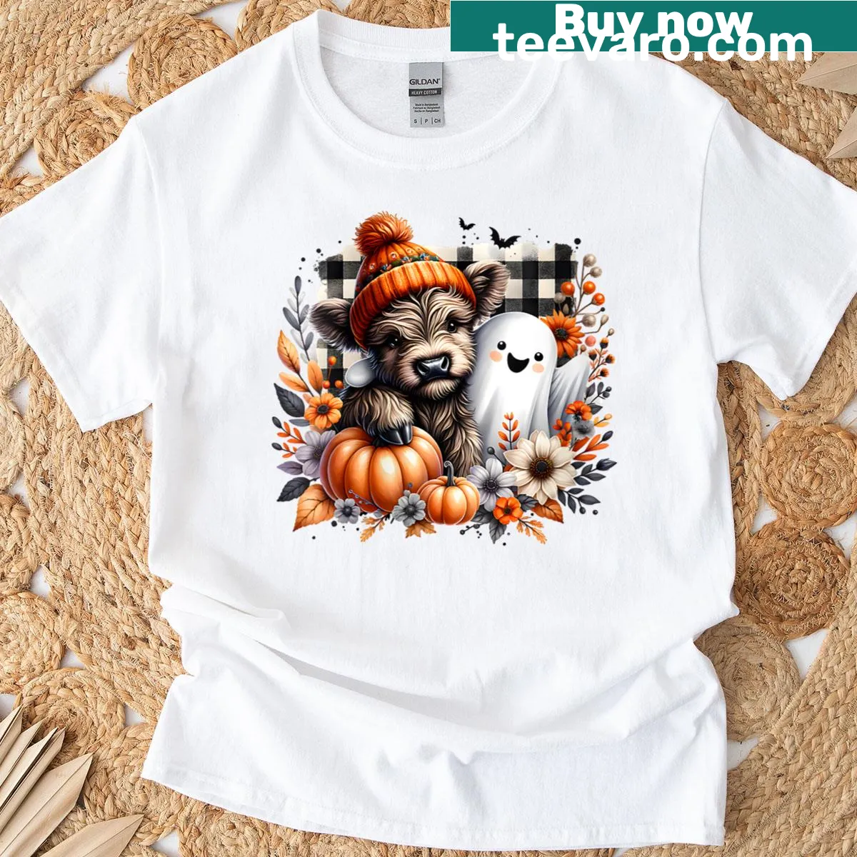Cute Halloween t-shirt featuring a Highland cow with ghosts and pumpkins — on a men's t-shirt