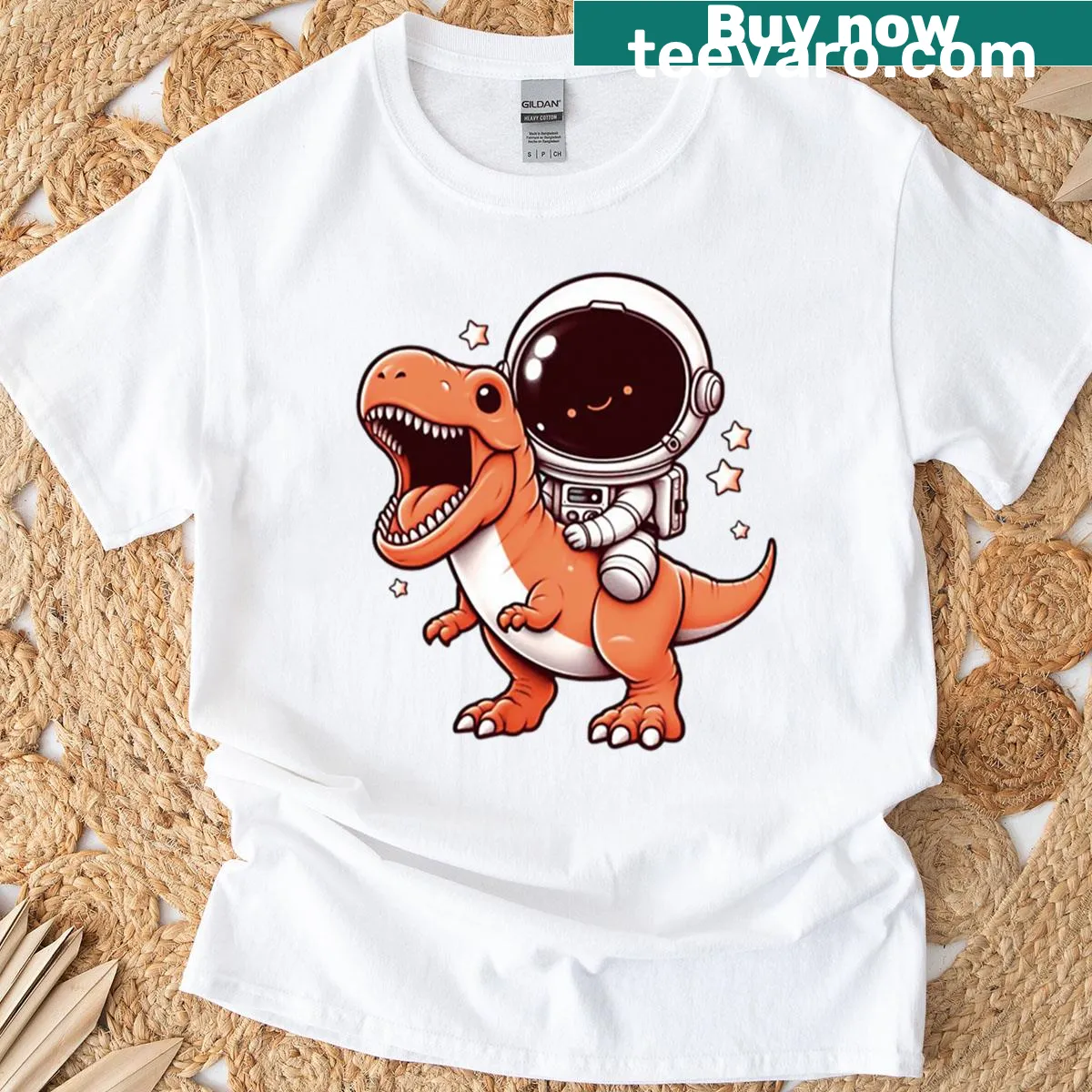 Astronaut riding a dinosaur T-shirt with playful illustration — on a men's t-shirt