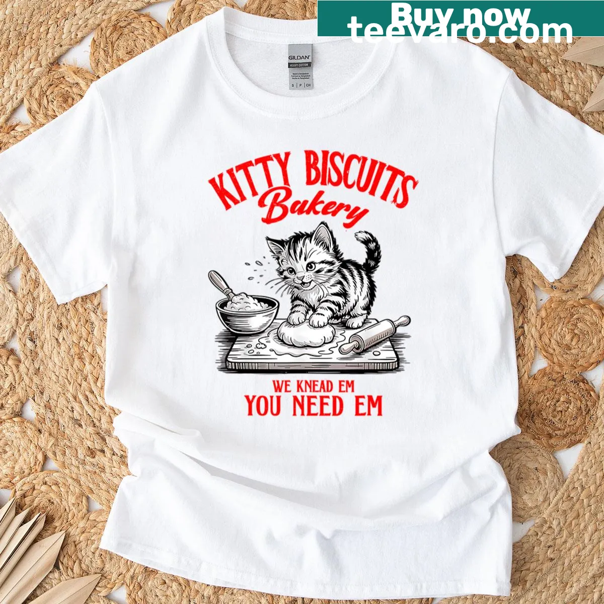 Funny T-shirt with cat kneading biscuits graphic and playful text — on a men's t-shirt