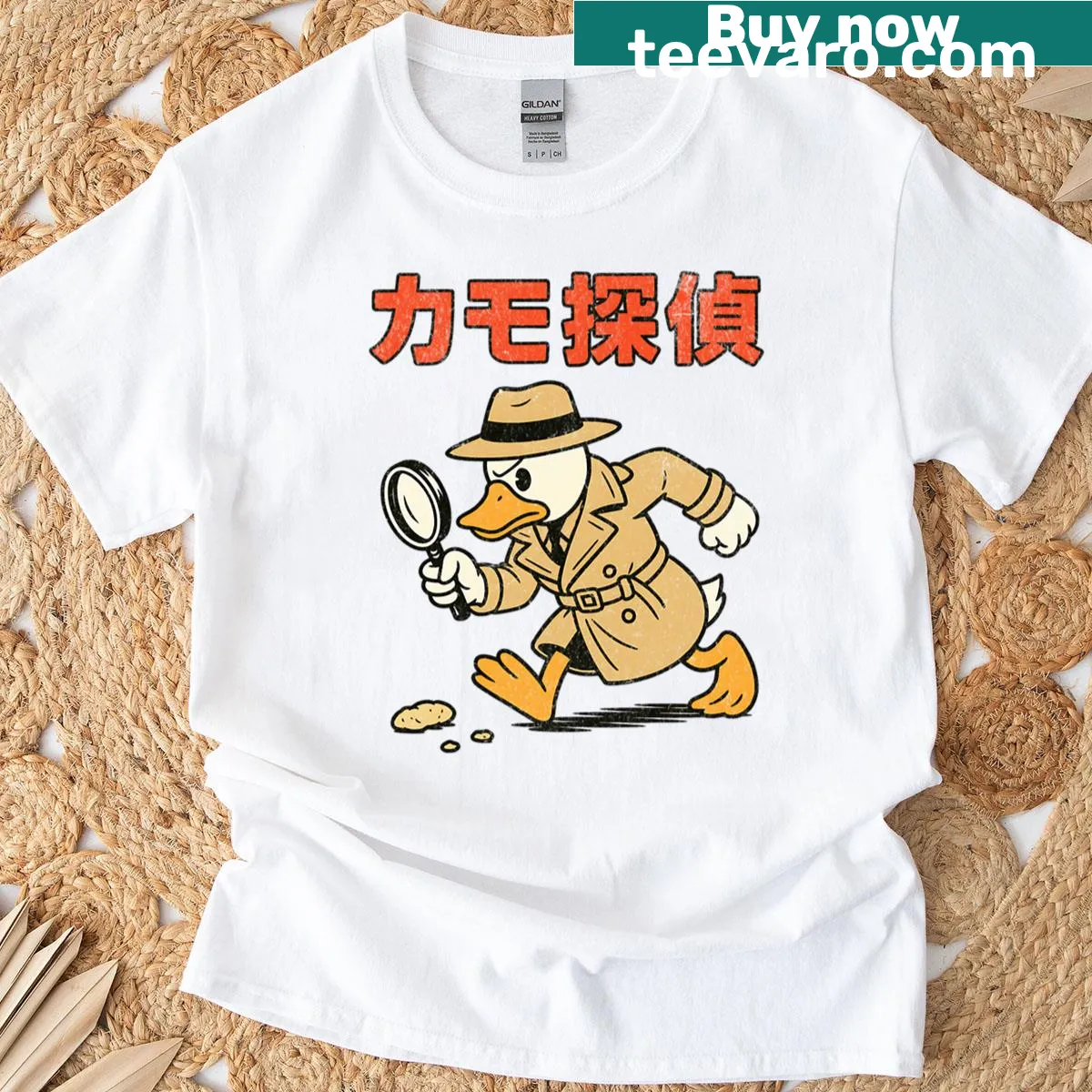 Cartoon duck detective graphic on a T-shirt — on a men's t-shirt