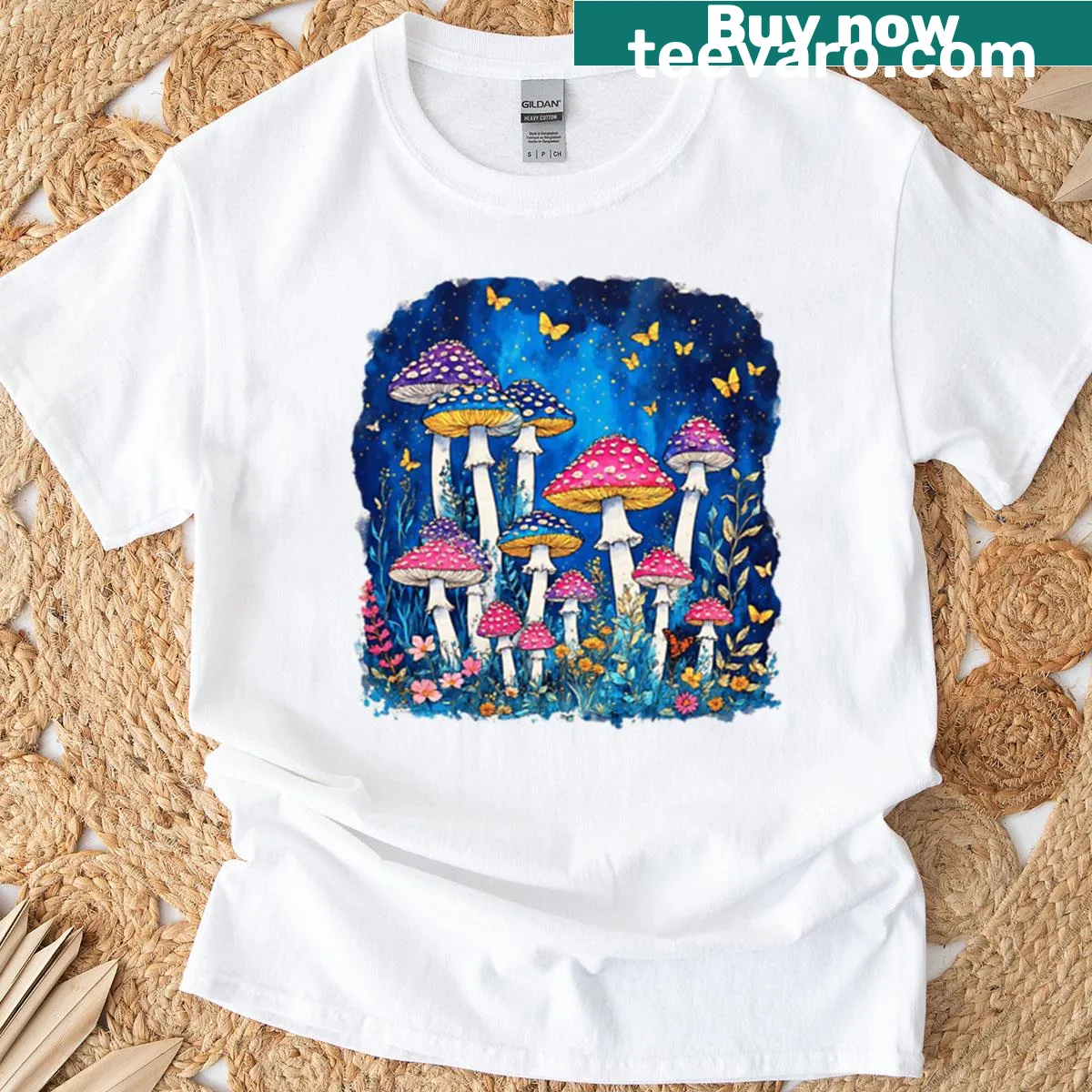 Oversized t-shirt featuring whimsical illustration of fly agaric mushrooms — on a men's t-shirt