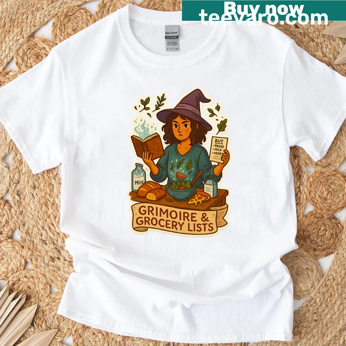 Oversized t-shirt with a whimsical grimoire grocery list graphic. — on a men's t-shirt
