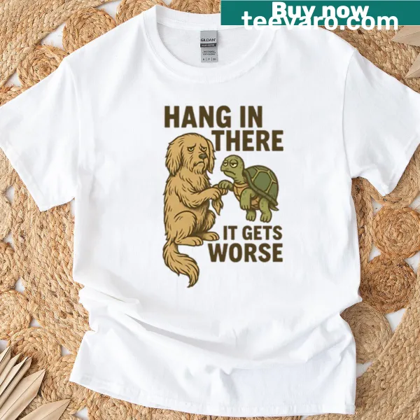 Humorous T-shirt with dog and turtle meme encouraging resilience.