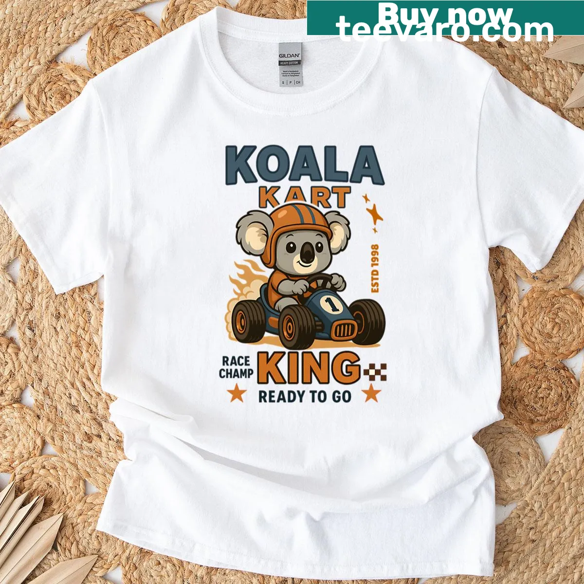Cute oversized t-shirt with a cartoon koala racing in a kart — on a men's t-shirt