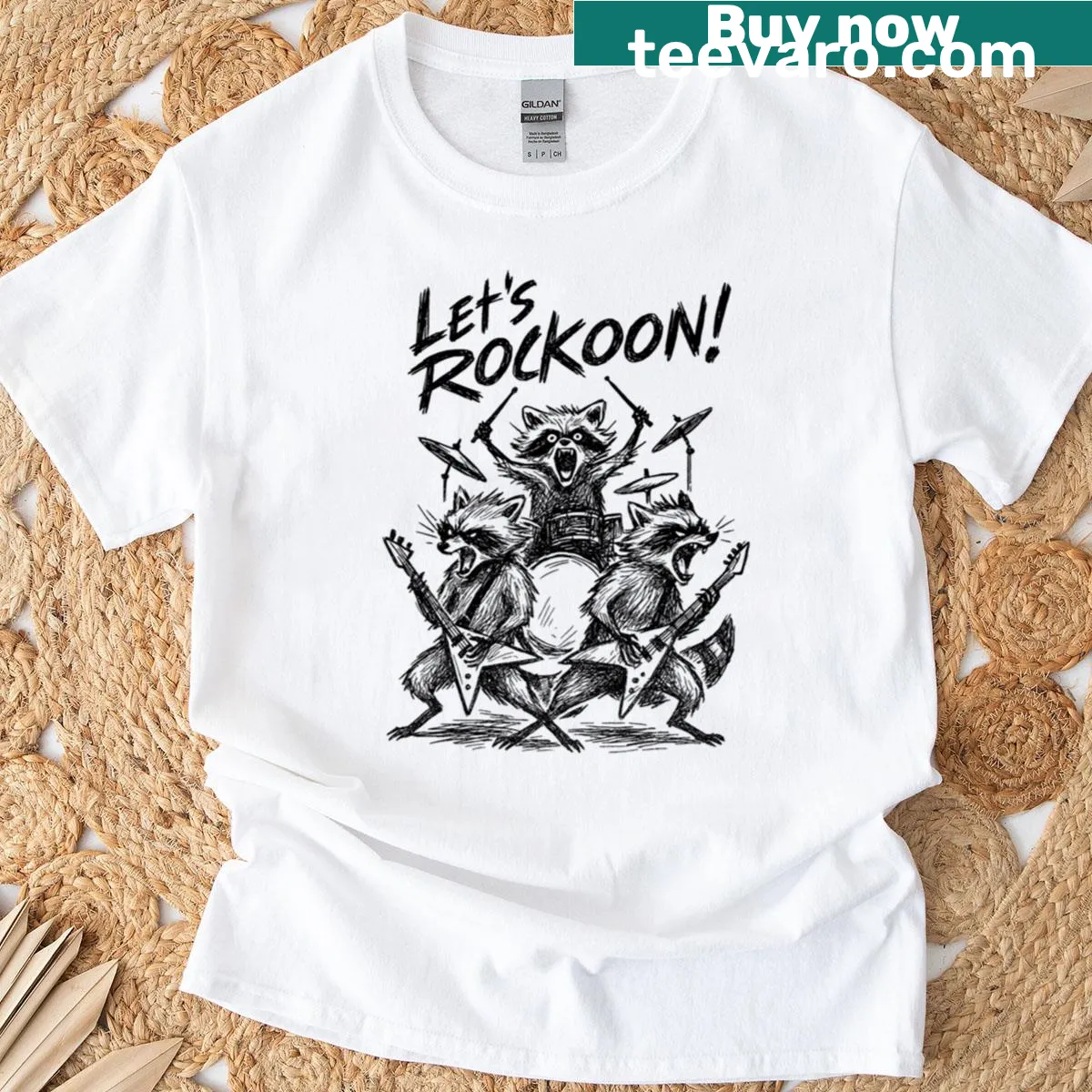 T-shirt featuring a playful illustration of raccoons in a band. — on a men's t-shirt