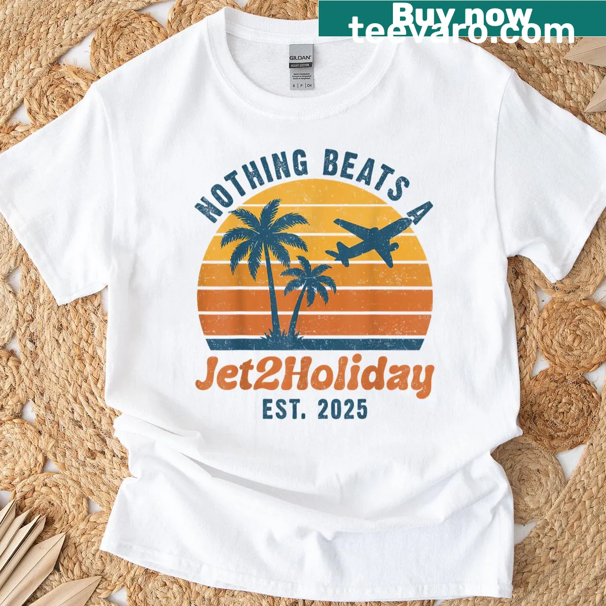 Vintage-style T-shirt celebrating Jet2 holidays with a beach sunset graphic — on a men's t-shirt
