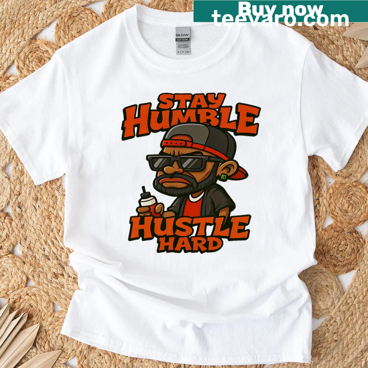 Motivational T-shirt with 'Stay Humble Hustle Hard' text — on a men's t-shirt
