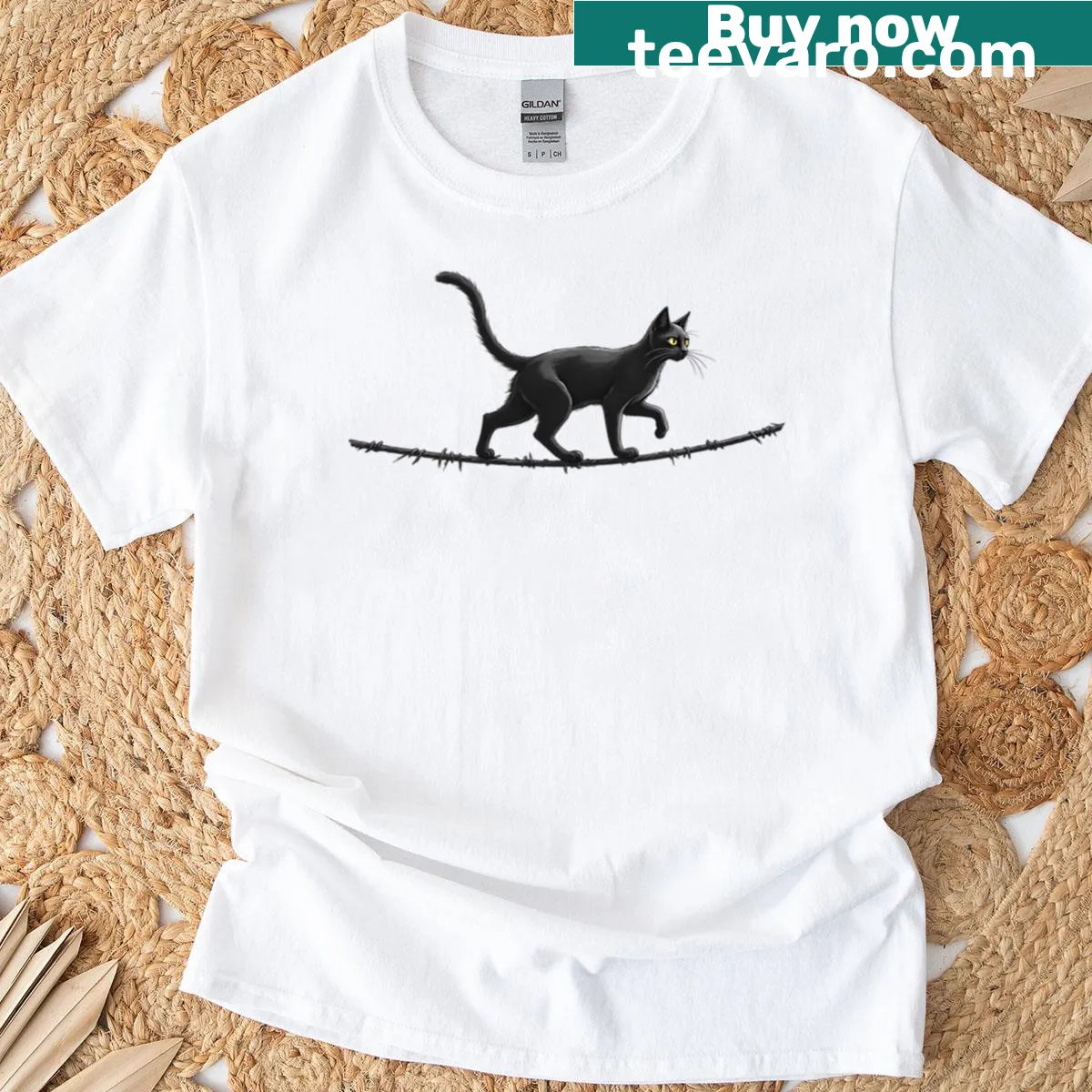 Illustration of a cat balancing on a tightrope in a whimsical design — on a men's t-shirt