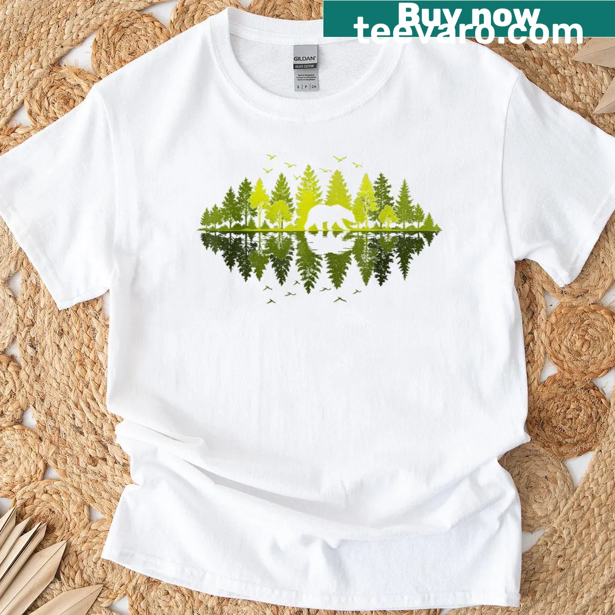 T-shirt depicting a bear and trees reflecting in nature — on a men's t-shirt