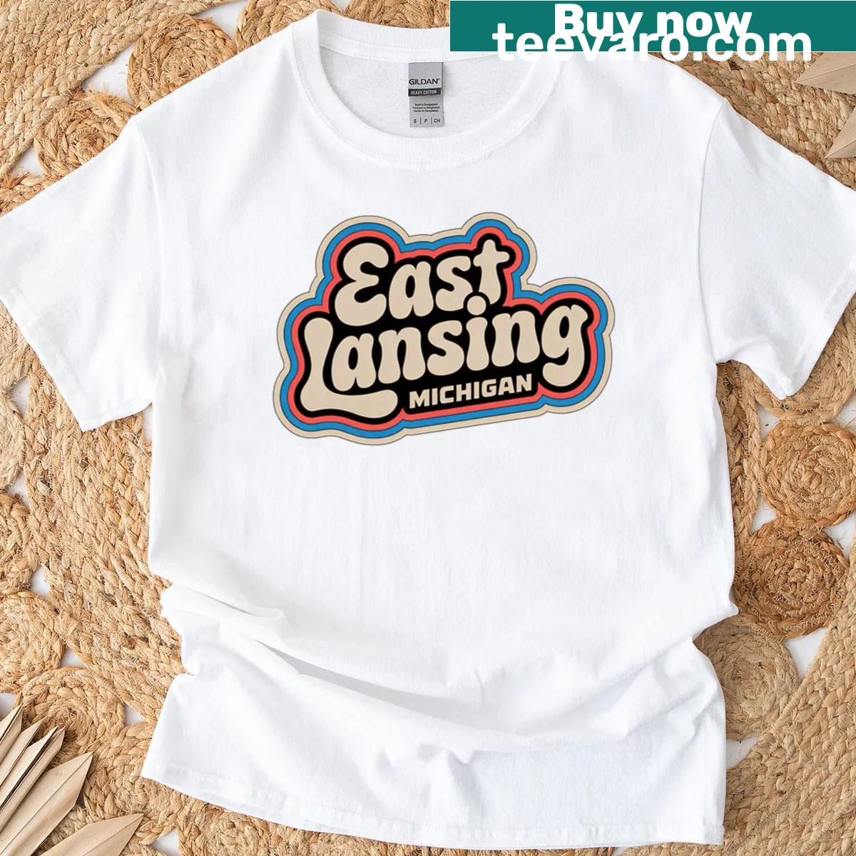 Vintage-inspired East Lansing Michigan t-shirt — on a men's t-shirt